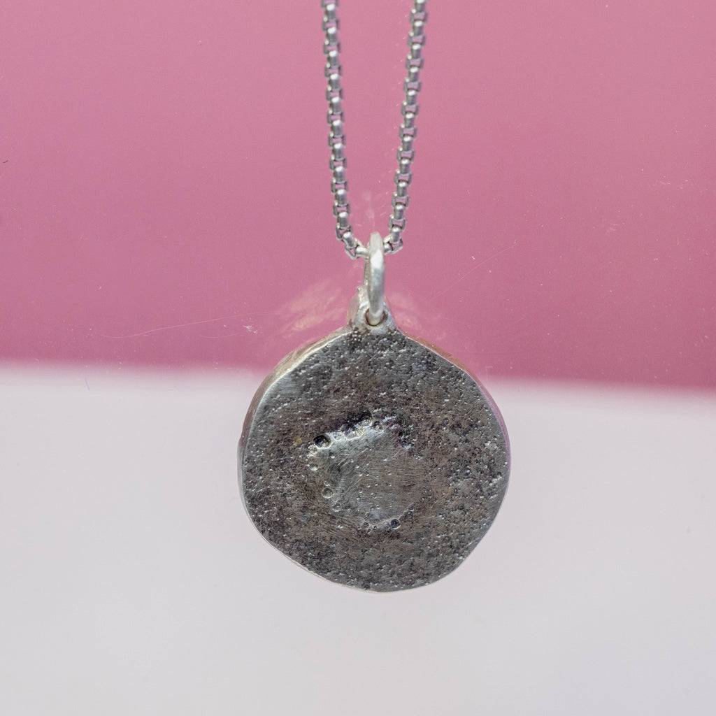 The Man in the Sun Pendant